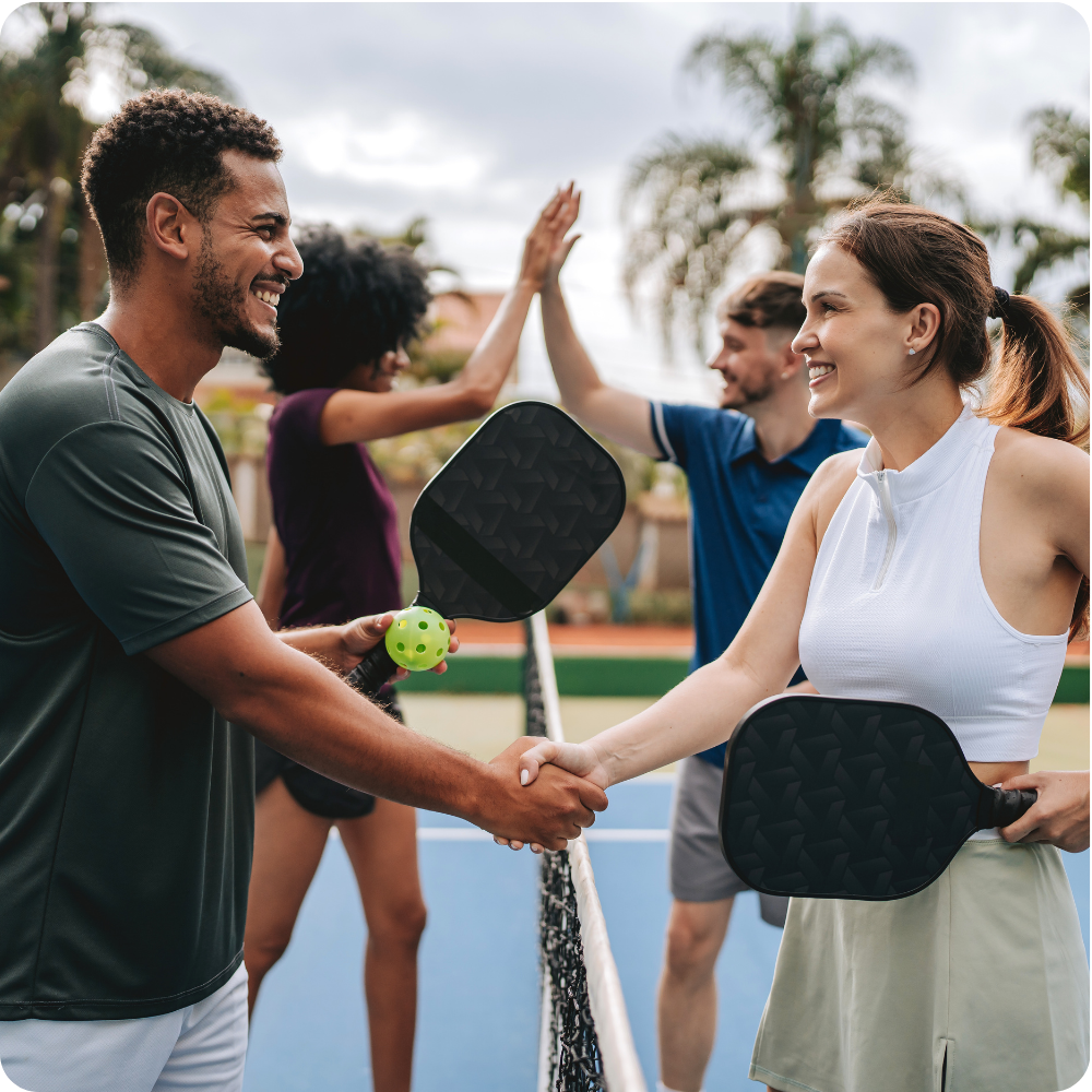 Private club members playing pickleball and socializing, representing member experience and club culture